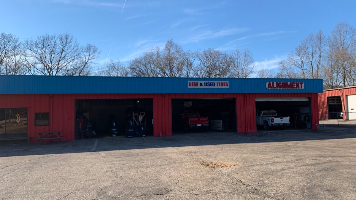 Between Cities Tires storefront and service bays
